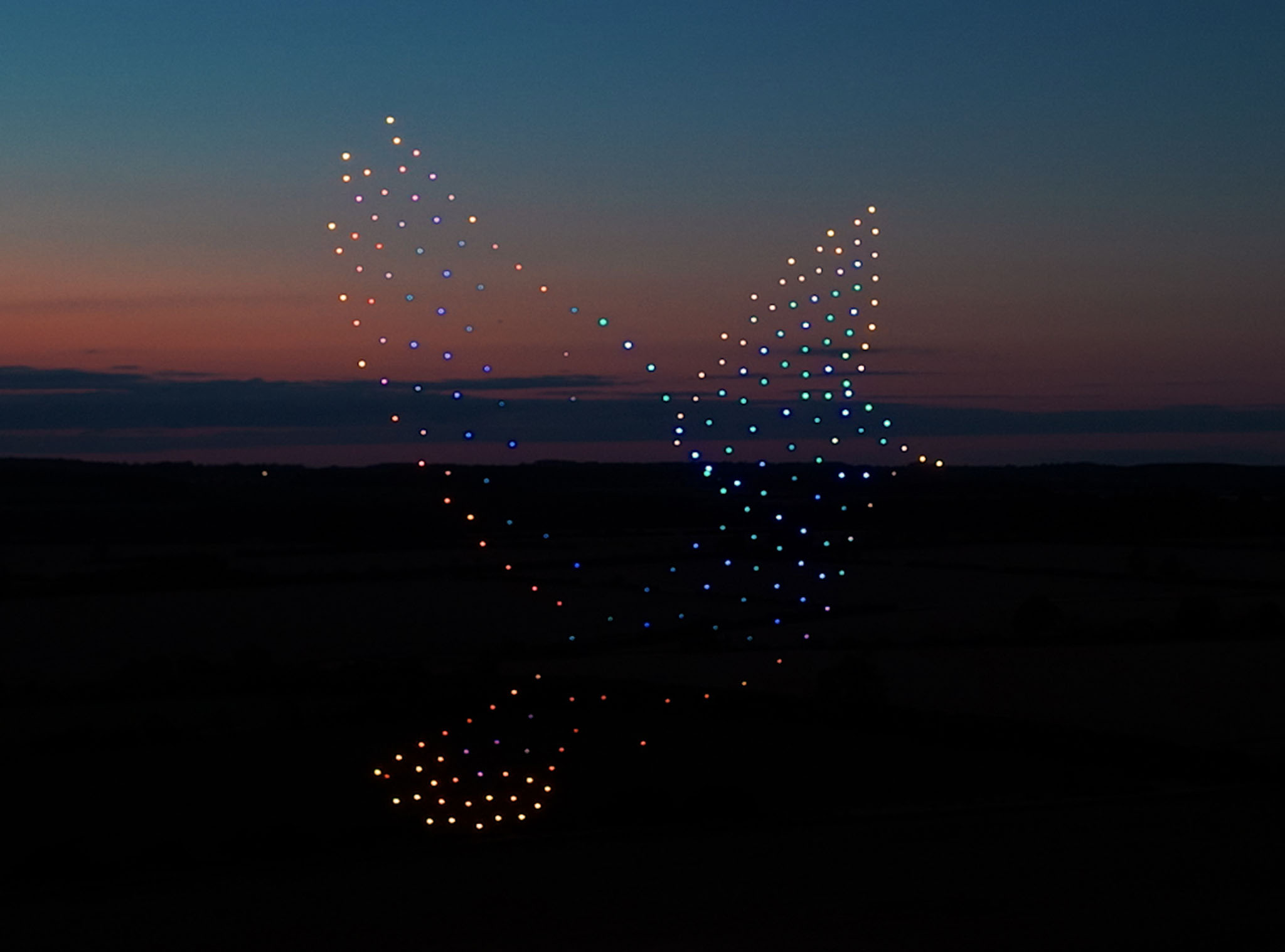 5A 300ft tall blue bird made from 225 drones